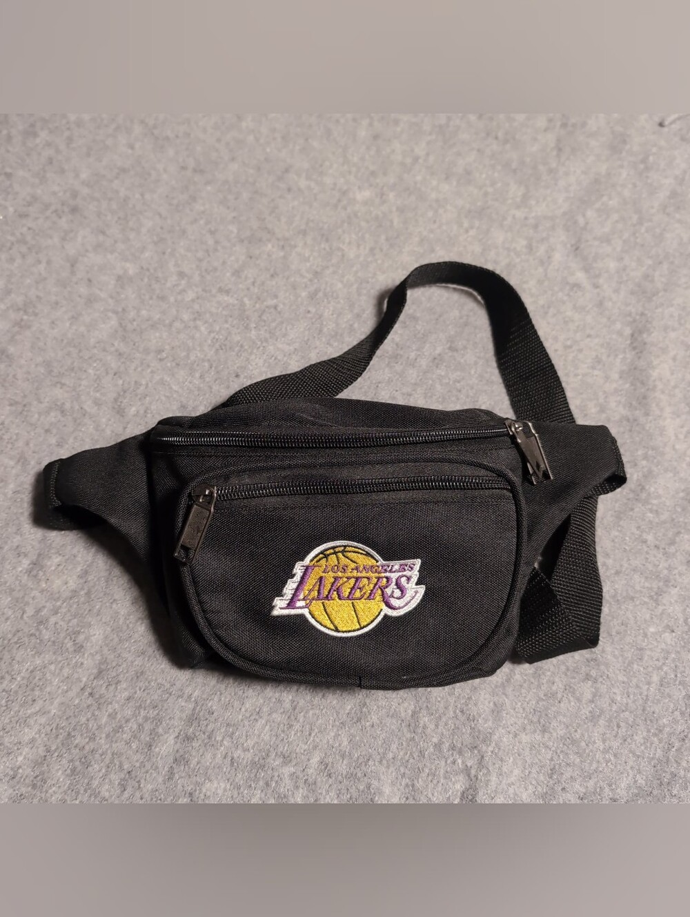 Y2K official Lakers fanny pack.